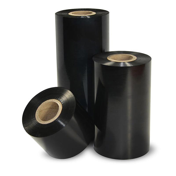 Three sizes of black thermal transfer ribbon standing besides each other on a white surface