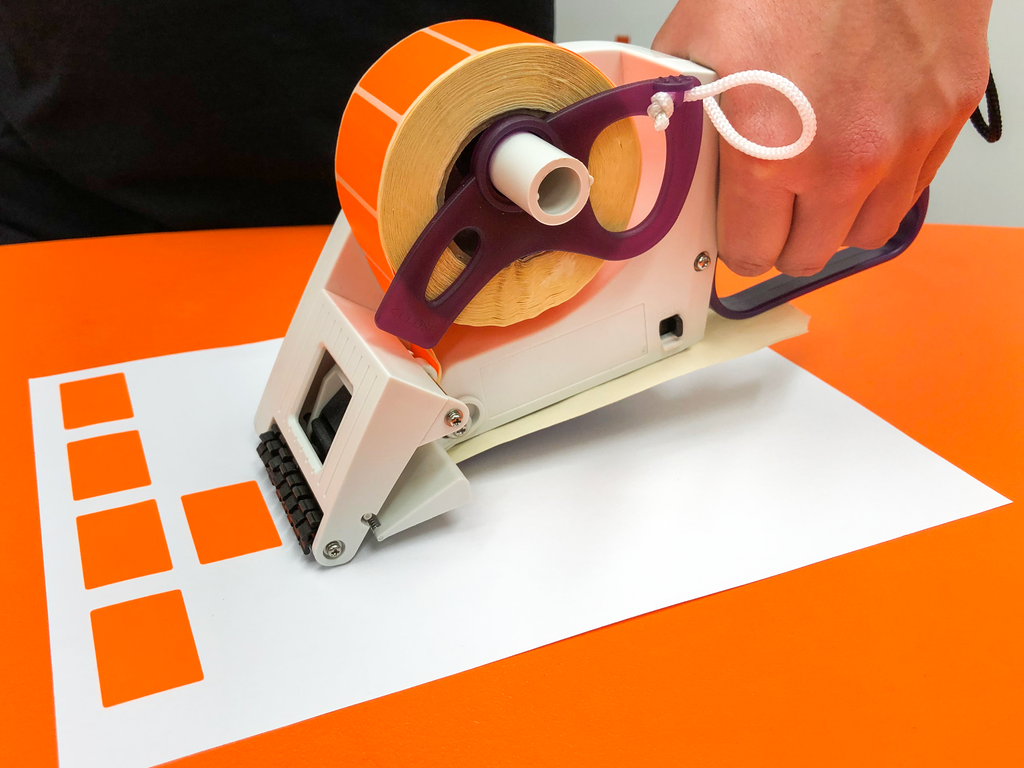 Handheld Label Applicator and Dispenser